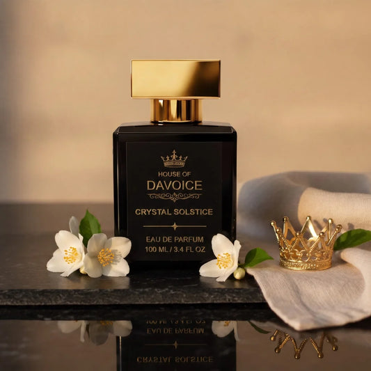 Crystal Solstice perfume 100 mL inspired by Baccarat Rouge perfume displayed on a black stone with gold crown