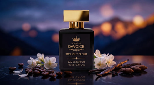 Twilight Fleur 25% Eau de Parfum bottle resting on dark obsidian stone surrounded by roasted espresso coffee beans, white jasmine petals, and split bourbon vanilla pods as the ultimate long-lasting YSL Black Opium dupe by House of DaVoice.