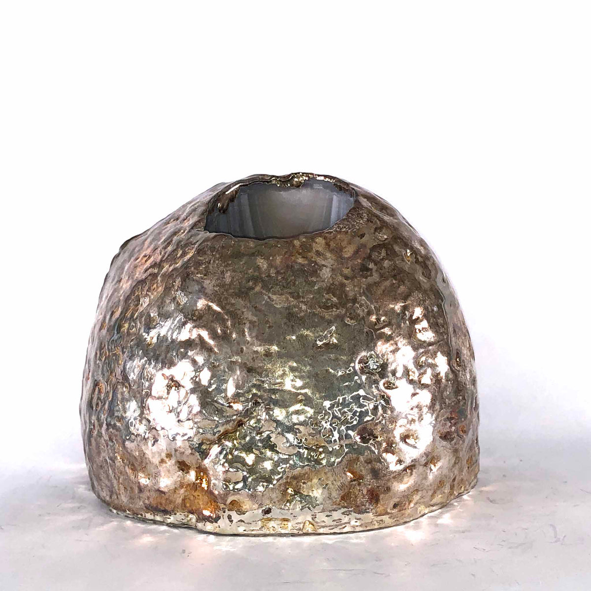 back of candle holder gold