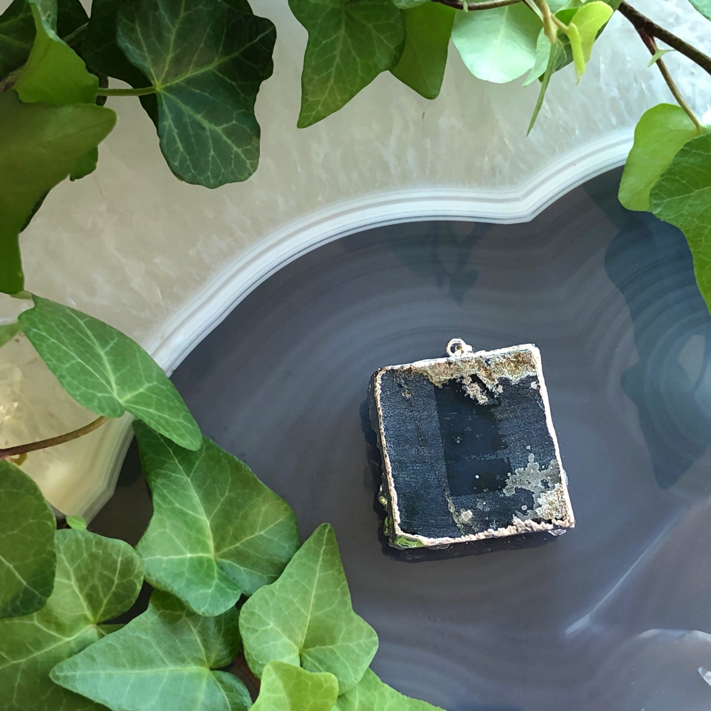 square purple necklace