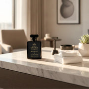 Bleu Valley men's citrus cologne is similar to Bleu de Chanel Eau de Parfum, and is displayed on a luxury bathroom vanity
