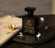 Crystal Solstice 50 mL BR540 dupe perfume is also comparable to Dossier Ambery Saffron, with gold crown and sitting on black stone