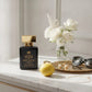 House of DaVoice Lemon Blue Sky Women's Citrus Perfume displayed on a luxury dresser with elegant accessories inspired by Dolce and Gabbana Light Blue Women's Perfume