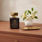 Marshmallow Halo floral marshmallow perfume displayed on a luxury dresser with elegant accessories