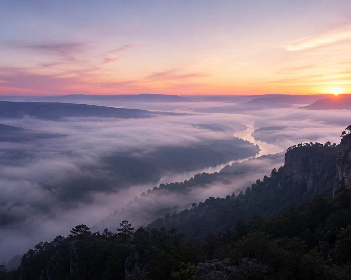 Luxury designer inspired fragrances overlooking the Arkansas River Valley at golden sunrise.