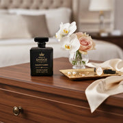 House of DaVoice Nuclear Flower women's floral perfume displayed on a luxury dresser inspired by Victor and Rolf Flowerbomb