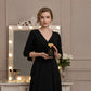 Elegant woman holding House of DaVoice Twilight Fleur perfume similar to YSL Black Opium perfume for women