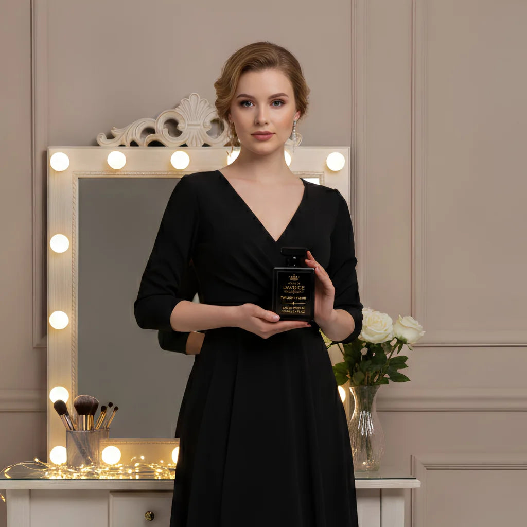 Elegant woman holding House of DaVoice Twilight Fleur perfume similar to YSL Black Opium perfume for women