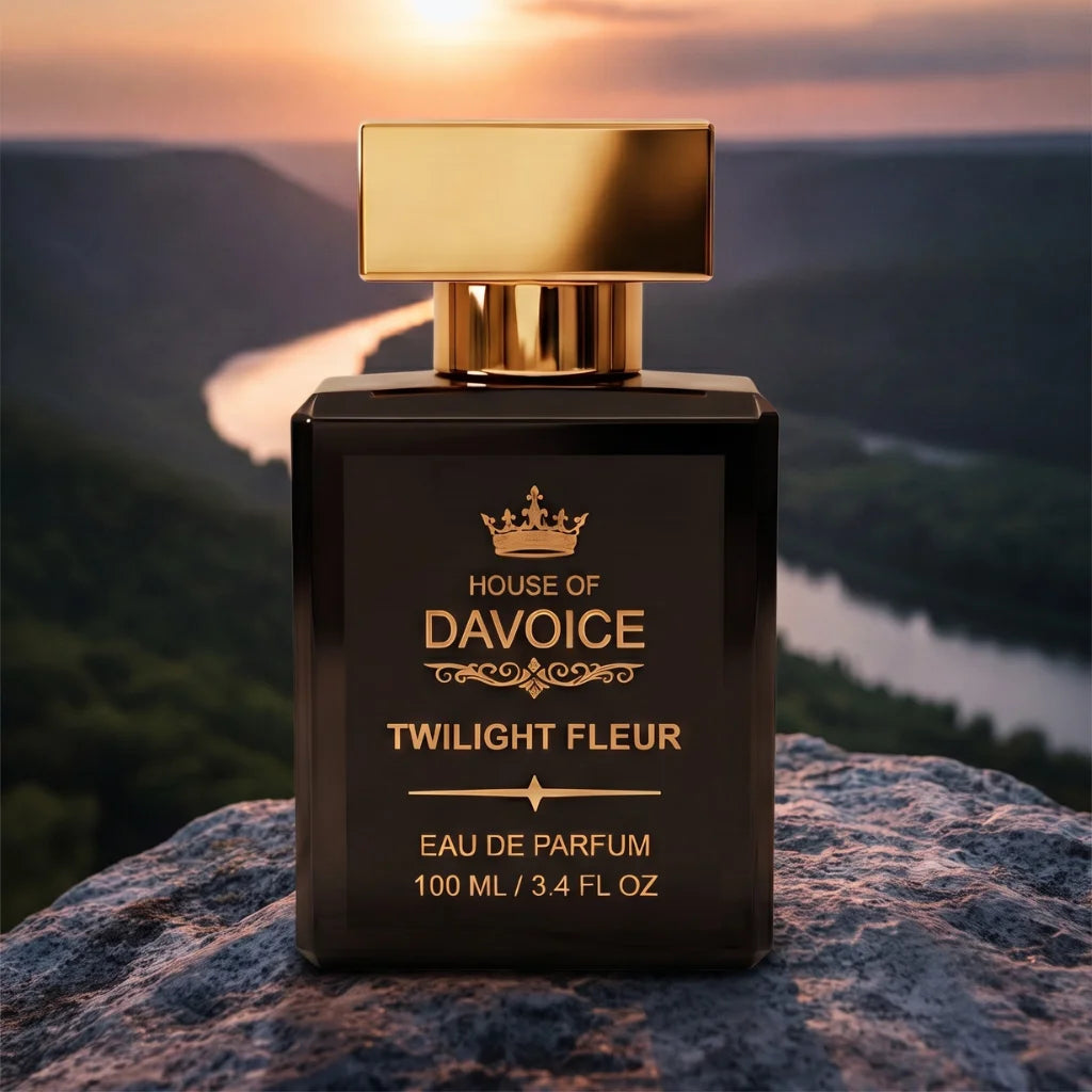 House of DaVoice Twilight Fleur perfumes like Black Opium displayed above a scenic river valley at sunset